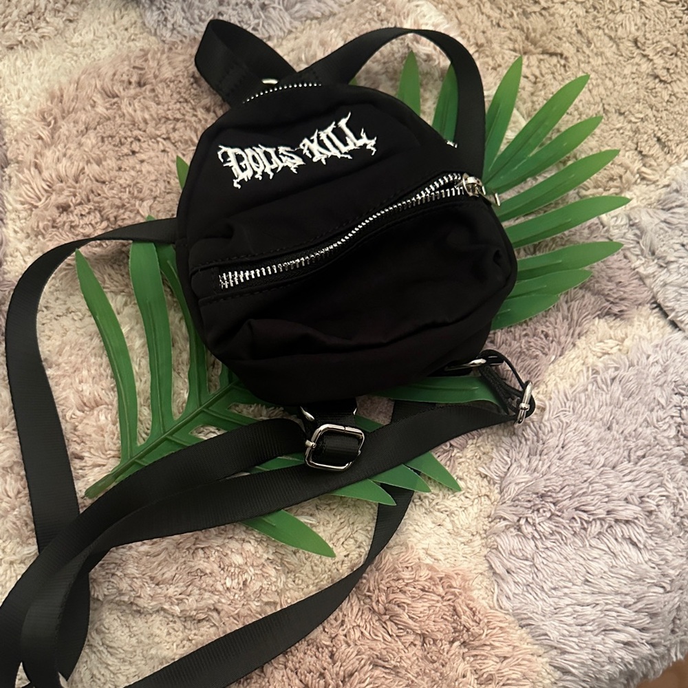DOLLSKILL Black Mini Backpack with Silver Accents